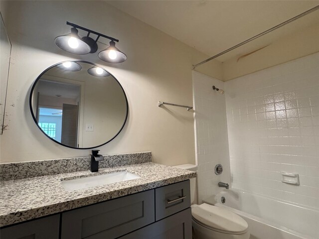 7400 Bellerive Dr Unit 1004, Houston, TX 77036 - bathroom featuring vanity, toilet, and shower / bathtub combination