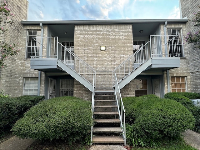 7400 Bellerive Dr Unit 1004, Houston, TX 77036 - view of property featuring stairs
