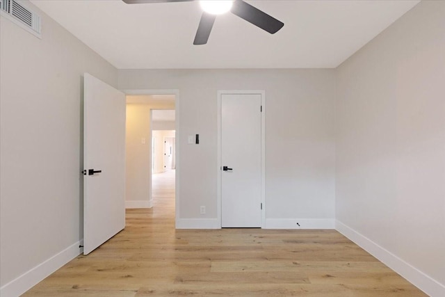 2506 Swan Ct, Houston, TX 77058 - unfurnished bedroom with baseboards and light wood-type flooring