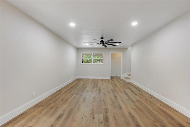 2506 Swan Ct, Houston, TX 77058 - spare room featuring recessed lighting, baseboards, light wood-style floors, and a ceiling fan