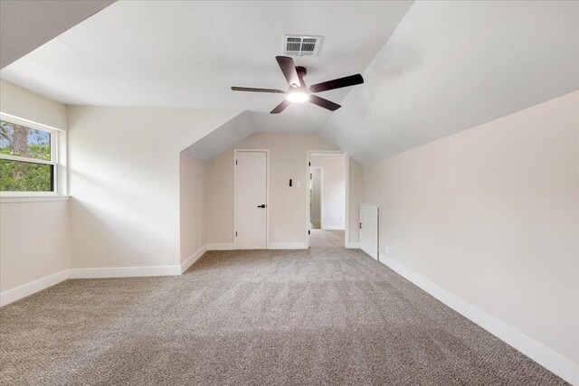 2506 Swan Ct, Houston, TX 77058 - additional living space featuring carpet, a ceiling fan, lofted ceiling, and baseboards