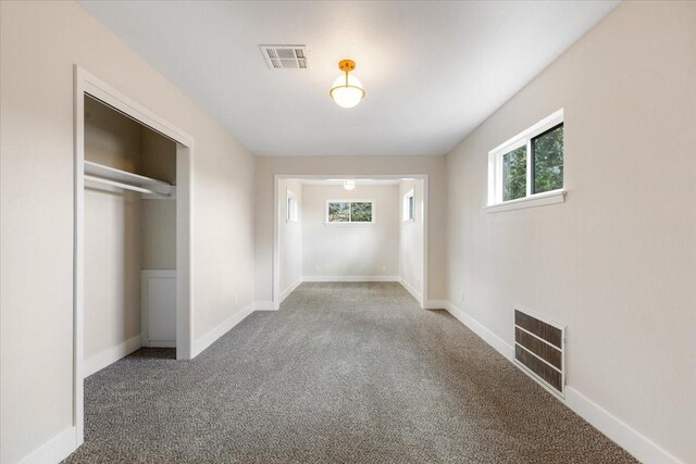 2506 Swan Ct, Houston, TX 77058 - hallway featuring carpet and baseboards