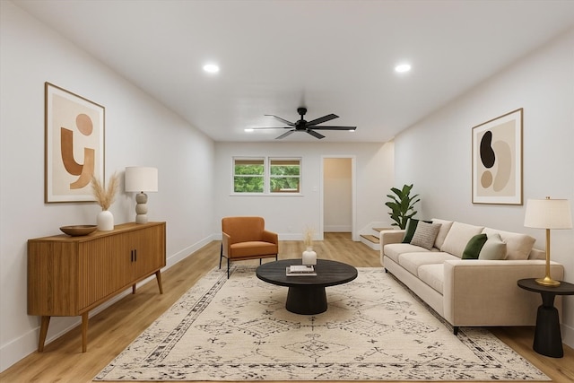 2506 Swan Ct, Houston, TX 77058 - living area featuring a ceiling fan, light wood-style floors, baseboards, and recessed lighting