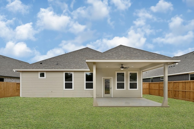 201 Big Spring Dr, Anahuac, TX 77514 - rear view of property featuring a ceiling fan, a patio area, and roof with shingles