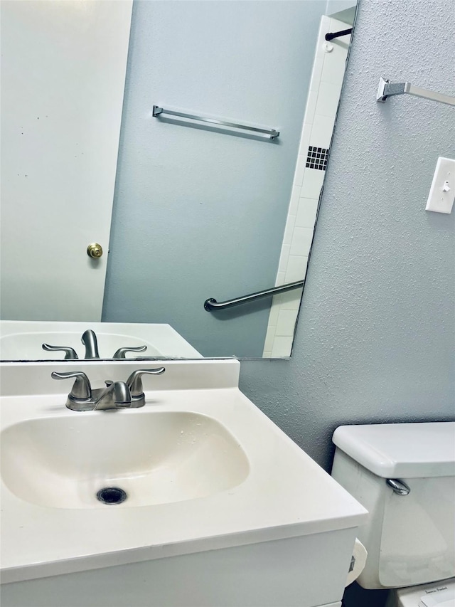 bathroom featuring a sink and toilet