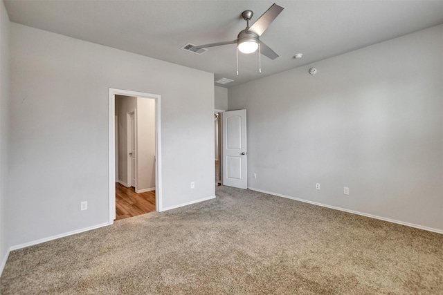unfurnished bedroom with carpet, baseboards, and ceiling fan