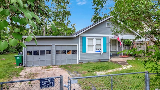 1227 W 25th St, Houston, TX 77008 - view of front of property featuring driveway and a garage