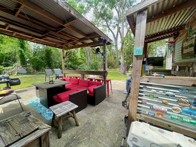 1227 W 25th St, Houston, TX 77008 - view of patio featuring an outdoor living space