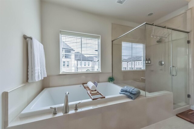 9450 London Bridge Sta, Houston, TX 77045 - full bathroom with a stall shower and a garden tub