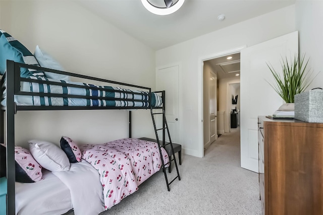 9450 London Bridge Sta, Houston, TX 77045 - bedroom featuring attic access, light colored carpet, and baseboards