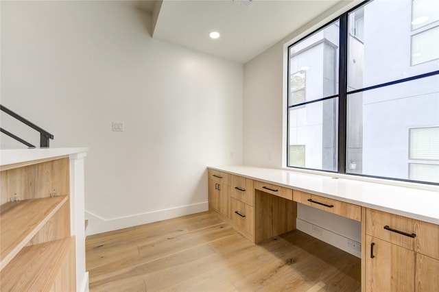 1611 W 22nd St Unit C, Houston, TX 77008 - unfurnished office with light wood-style flooring, baseboards, built in study area, and recessed lighting