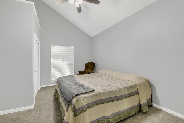 carpeted bedroom with baseboards, vaulted ceiling, and a ceiling fan