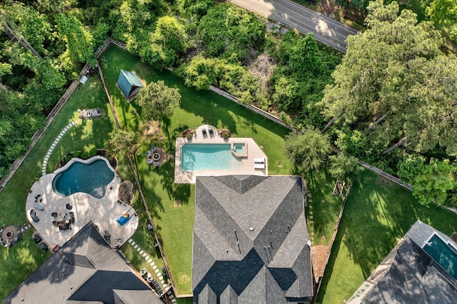 514 Chirping Sparrow Ct, Pinehurst, TX 77362 - aerial view of property and surrounding area with a pool area