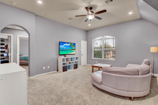 514 Chirping Sparrow Ct, Pinehurst, TX 77362 - carpeted living area featuring ceiling fan, arched walkways, recessed lighting, and baseboards