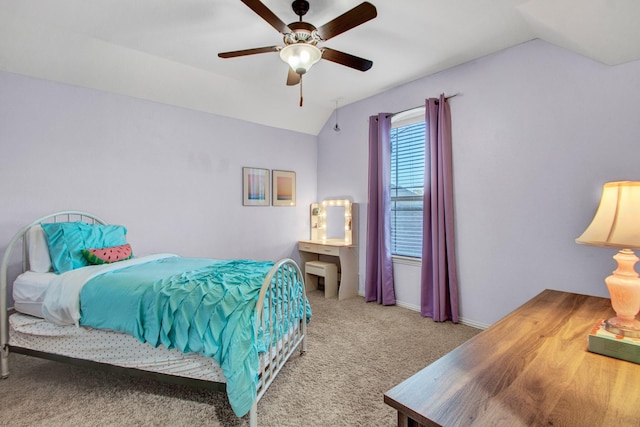 514 Chirping Sparrow Ct, Pinehurst, TX 77362 - bedroom featuring vaulted ceiling, carpet flooring, ceiling fan, and baseboards