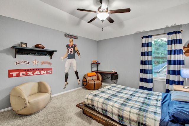 514 Chirping Sparrow Ct, Pinehurst, TX 77362 - carpeted bedroom with baseboards and a ceiling fan