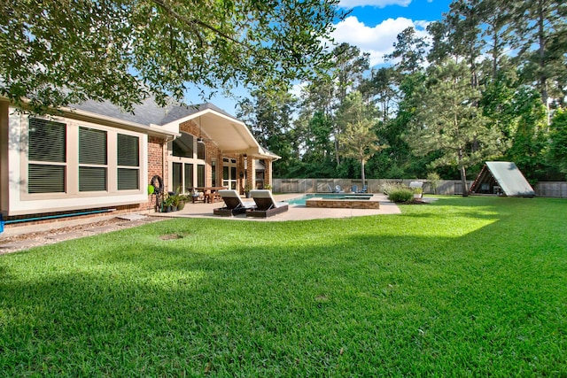 514 Chirping Sparrow Ct, Pinehurst, TX 77362 - view of yard featuring a patio