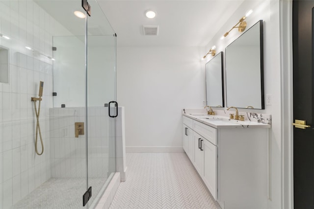 317 Kelley St, Houston, TX 77009 - bathroom with a stall shower, double vanity, baseboards, tile patterned floors, and recessed lighting