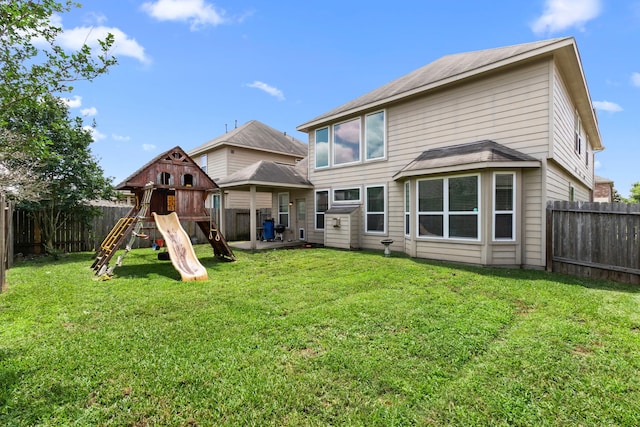 30722 Lavender Trace Dr, Spring, TX 77386 - rear view of house featuring a playground