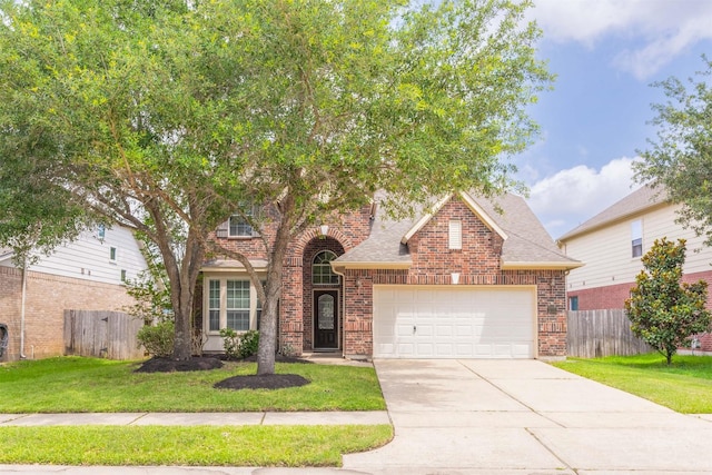 3722 Rocky Ledge Ln, Katy, TX 77494 - traditional-style home with brick siding, concrete driveway, an attached garage, and a shingled roof