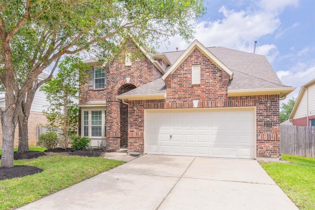 3722 Rocky Ledge Ln, Katy, TX 77494 - traditional home featuring brick siding, driveway, a garage, and a shingled roof