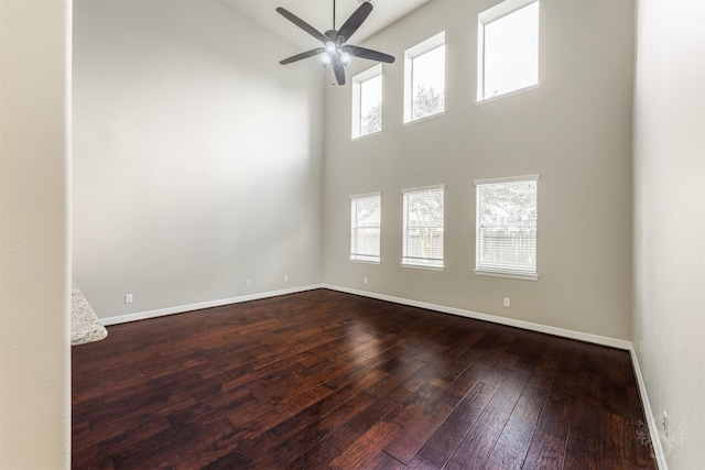 3722 Rocky Ledge Ln, Katy, TX 77494 - unfurnished room featuring high vaulted ceiling, a ceiling fan, plenty of natural light, dark wood finished floors, and baseboards