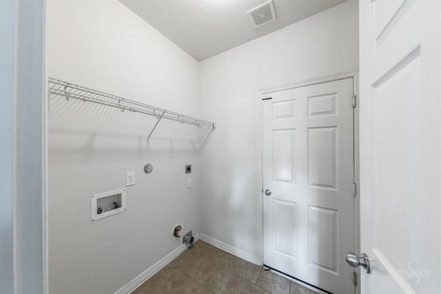 3722 Rocky Ledge Ln, Katy, TX 77494 - laundry area with gas dryer hookup, hookup for a washing machine, electric dryer hookup, baseboards, and tile patterned floors