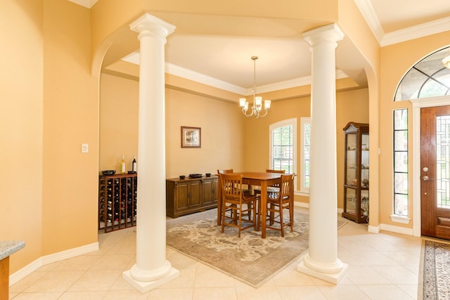 54 Scotch Pine Ct, Lake Jackson, TX 77566 - dining area featuring light tile patterned floors, arched walkways, crown molding, decorative columns, and baseboards