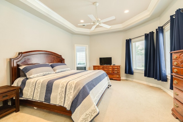 54 Scotch Pine Ct, Lake Jackson, TX 77566 - carpeted bedroom featuring multiple windows, a tray ceiling, ceiling fan, baseboards, and recessed lighting