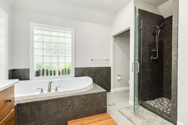 54 Scotch Pine Ct, Lake Jackson, TX 77566 - bathroom featuring plenty of natural light, a stall shower, a garden tub, and vanity