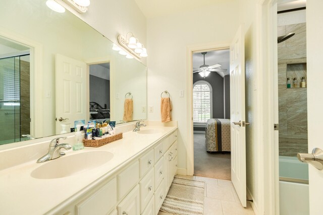 54 Scotch Pine Ct, Lake Jackson, TX 77566 - ensuite bathroom with tile patterned flooring, double vanity, ceiling fan, and a shower