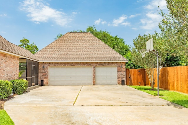 54 Scotch Pine Ct, Lake Jackson, TX 77566 - view of front of house with brick siding, driveway, fence, and a garage