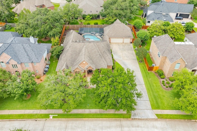 54 Scotch Pine Ct, Lake Jackson, TX 77566 - aerial perspective of suburban area featuring a pool