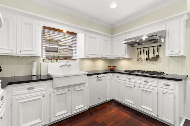kitchen with white dishwasher, stainless steel gas cooktop, range hood, white cabinets, and ornamental molding
