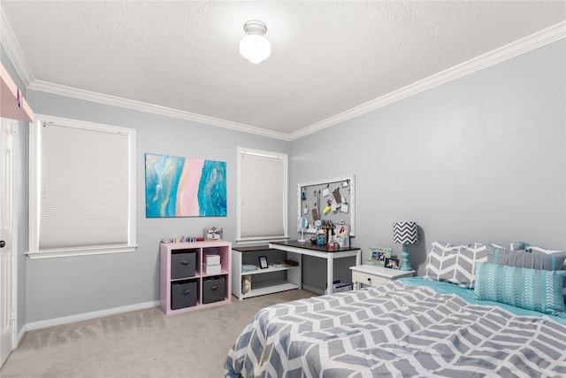 carpeted bedroom with ornamental molding, baseboards, and a textured ceiling