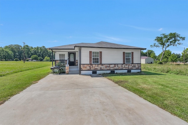 1107 Cypress St, Diboll, TX 75941 - view of front of home with covered porch and a front lawn
