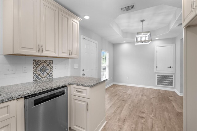 1107 Cypress St, Diboll, TX 75941 - kitchen with dishwasher, baseboards, light wood-type flooring, tasteful backsplash, and recessed lighting