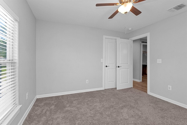 1107 Cypress St, Diboll, TX 75941 - unfurnished bedroom featuring carpet flooring and baseboards