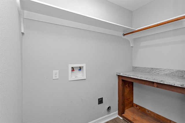 1107 Cypress St, Diboll, TX 75941 - clothes washing area with hookup for an electric dryer, hookup for a washing machine, and baseboards