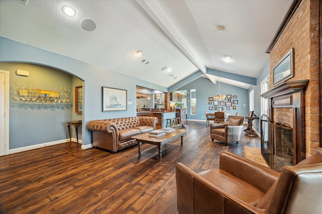 3814 Todville Rd, Seabrook, TX 77586 - living area featuring wood finished floors, baseboards, and a fireplace