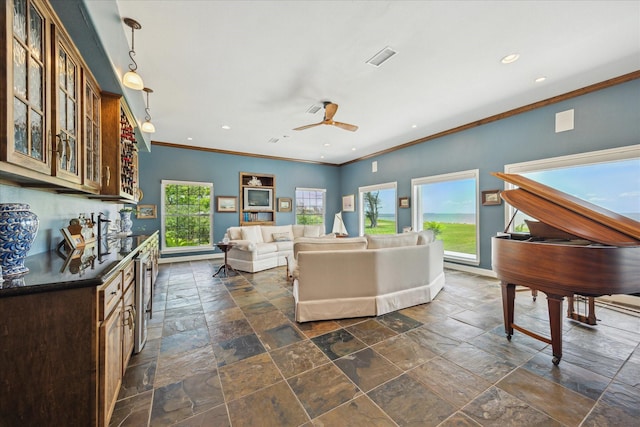 3814 Todville Rd, Seabrook, TX 77586 - living area featuring crown molding, stone tile flooring, ceiling fan, baseboards, and wine cooler