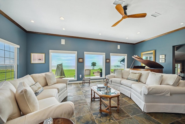 3814 Todville Rd, Seabrook, TX 77586 - living area featuring stone tile floors, recessed lighting, ornamental molding, ceiling fan, and baseboards