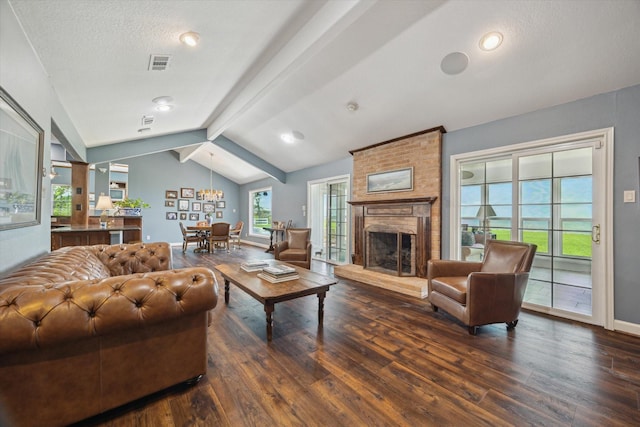 3814 Todville Rd, Seabrook, TX 77586 - living room with hardwood / wood-style flooring, baseboards, and a large fireplace