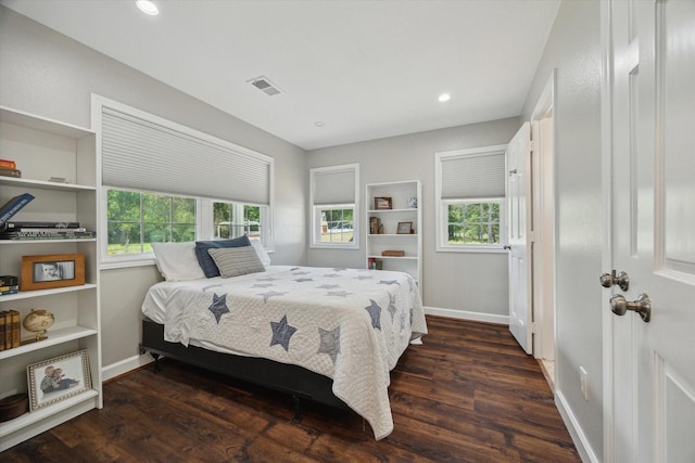 3814 Todville Rd, Seabrook, TX 77586 - bedroom with dark wood finished floors, baseboards, multiple windows, and recessed lighting