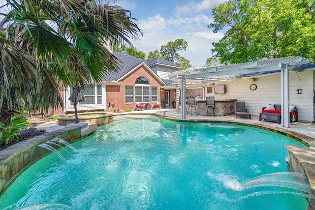view of swimming pool with a pergola, a pool with connected hot tub, and a patio area