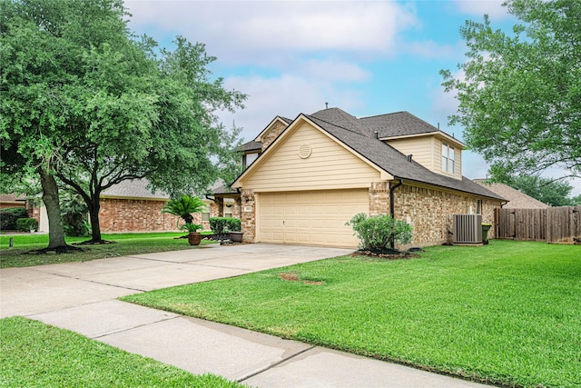 traditional-style house featuring central AC unit, concrete driveway, an attached garage, brick siding, and roof with shingles