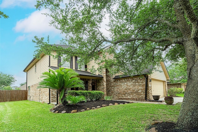 view of front of house featuring stone siding, an attached garage, and roof with shingles