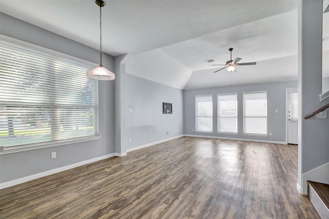 3807 Springcrest Ln, Montgomery, TX 77356 - unfurnished living room with a ceiling fan, healthy amount of natural light, wood finished floors, baseboards, and lofted ceiling