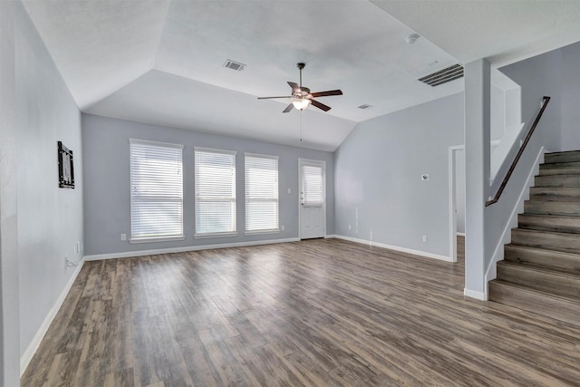 3807 Springcrest Ln, Montgomery, TX 77356 - unfurnished living room featuring ceiling fan, dark wood-style floors, vaulted ceiling, stairway, and baseboards