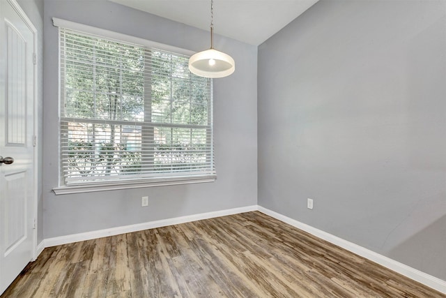 3807 Springcrest Ln, Montgomery, TX 77356 - unfurnished dining area with wood finished floors and baseboards